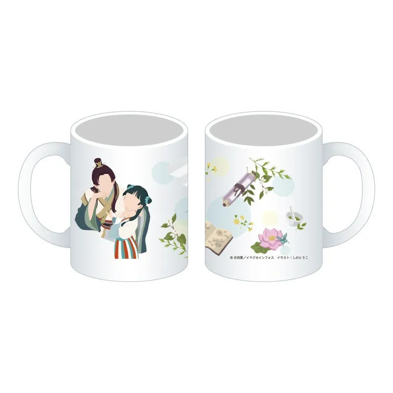 2つのマグカップが並んだ画像です。左側のマグカップには2人の人物が描かれており、右側のマグカップには巻物や花などのイラストが描かれています。