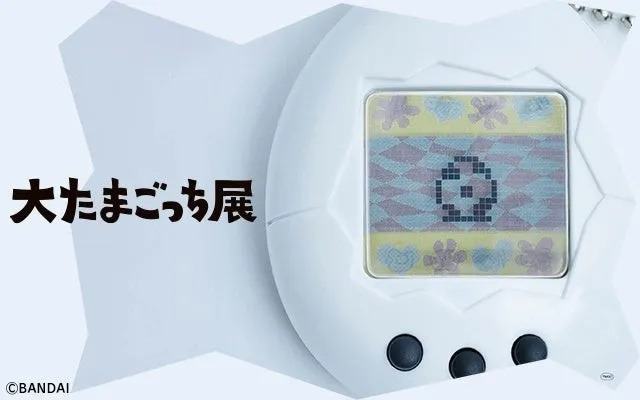 大たまごっち展の告知画像。たまごっち本体とロゴが特徴的。